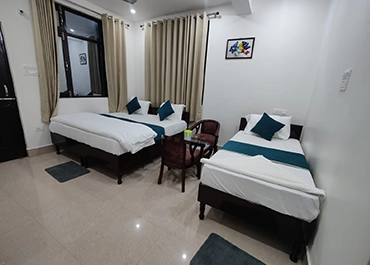 Hotel Manokamna Bed Room